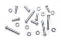 Macro Of A Small Collection Of Iron Screws And Bolts In A Whitebox