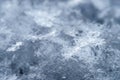 Macro of snowflake in natural surroundings. Royalty Free Stock Photo