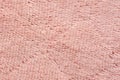 Macro of soft textile, Close up of short pile pink carpet woven, Fluffy fiber fabric cloth
