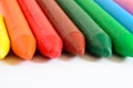 Macro of some colored wax crayons on a white background. Royalty Free Stock Photo