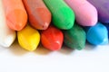 Macro of some colored wax crayons on a white background. Royalty Free Stock Photo