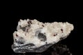 Macro stone Cinnabar dolomite mineral on a black background