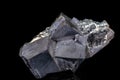 Macro stone mineral Galena on a black background Royalty Free Stock Photo