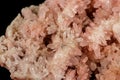 Macro stone mineral pink quartz amethyst on a black background Royalty Free Stock Photo