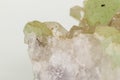 Macro stone mineral Prehnite Babingtonite On a white background Royalty Free Stock Photo