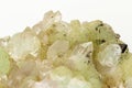 Macro stone mineral Prehnite Babingtonite On a white background Royalty Free Stock Photo