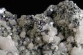 Macro stone mineral Quartz Calcite Sphalerite Galena on a black background