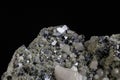 Macro stone mineral Quartz Calcite Sphalerite Galena on a black background