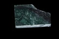 Macro stone Nephrite mineral on black background Royalty Free Stock Photo