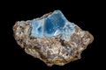 Macro stone Opal mineral in rock on a black background Royalty Free Stock Photo