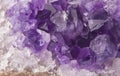 Macro structure of natural violet amethyst gem stone crystals texture