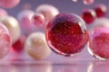 Cinematic close-up of pink and red glass bubbles and orbs with sparkling details Royalty Free Stock Photo