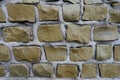 Macro of surface of olive green mosaic wall