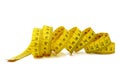 Macro of tangled yellow measure tape Royalty Free Stock Photo