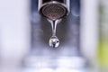 Macro of a tap water droplet Royalty Free Stock Photo