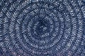 Macro texture of blue threads tied in a spiral between which there are white gaps. Close-up of knitted fabric Royalty Free Stock Photo