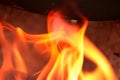 macro texture flame from the burning logs in the fireplace,fire Royalty Free Stock Photo