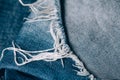 Macro texture of jeans hole and threads Royalty Free Stock Photo