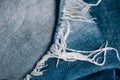 Macro texture of jeans hole and threads. Royalty Free Stock Photo