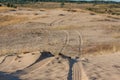 Macro texture tire tracks in the sand Royalty Free Stock Photo