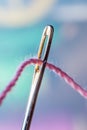 Macro of a thread through needle eye Royalty Free Stock Photo