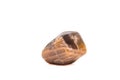 Macro tumbled dark peach moonstone crystal Royalty Free Stock Photo