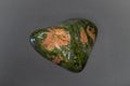 Macro tumbled green and orange Unakite Jasper chalcedony crystal