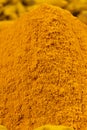 Macro Turmeric Powder, Vertical Photo. Royalty Free Stock Photo