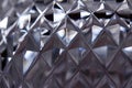 Macro view of beautiful lead crystal glass with diamond cut facets Royalty Free Stock Photo