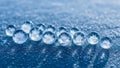 Macro view of clear ice spheres with internal crystal patterns on wet surface Royalty Free Stock Photo