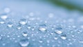 Macro view of clear water droplets on a textured surface Royalty Free Stock Photo