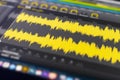 a macro view of the computer monitor screen with sound audio wave graph volume Royalty Free Stock Photo
