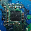 Digital Brain - CPU on a Blue Motherboard Royalty Free Stock Photo