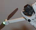 Macro view drone sensor and drone propeller focus is on second propeller droning concept video film making operator rent equipment Royalty Free Stock Photo