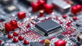 Macro view of an electronic circuit board with integrated chips and red components showcasing detailed connections and technology Royalty Free Stock Photo
