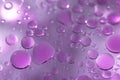 Macro view of lilac oil bubbles in the water Royalty Free Stock Photo