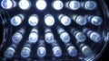 Macro view of lit LED lamps of a portable flashlight in perspective Royalty Free Stock Photo