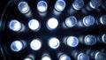 Macro view of lit LED lamps of a portable flashlight in perspective Royalty Free Stock Photo