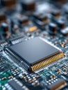 Macro view of a modern microchip mounted on a circuit board featuring intricate electronic components illuminated with subtle Royalty Free Stock Photo