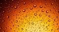 Close up of amber liquid with condensation droplets on glass surface water Royalty Free Stock Photo