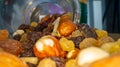 Macro view of the nuts, seeds and dried fruits in a glass jar Royalty Free Stock Photo