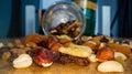 Macro view of the nuts, seeds and dried fruits in a glass jar Royalty Free Stock Photo