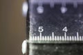 Macro view of old and worn measuring instrument units in inches centimeter milimeter