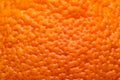 Macro view on orange fruit peel texture background Royalty Free Stock Photo