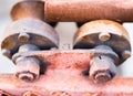 Macro view of a rusty object. Detail of a metallic old machinary. Pattern of brown details. Textured and rusted surface Royalty Free Stock Photo