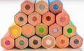 Macro view of a tower of wooden color pencils, back view Royalty Free Stock Photo