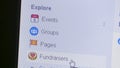 Macro view of a user selecting and deciding on Event, Groups, Pages and more on the Facebook sidebar.