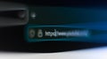 Macro view of a web browser address bar with a motion blur effect showing a secure https URL and padlock icon Royalty Free Stock Photo