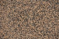 Macro of wall with brown and black pebbledash finish Royalty Free Stock Photo