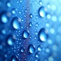 Macro of Water Droplets on Blue Surface Abstract Background Texture Royalty Free Stock Photo
